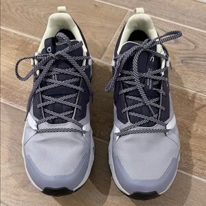 On Running Purple and Green Athletic Shoes